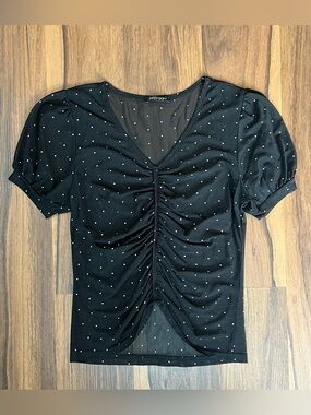 Black mesh top with white polka dots